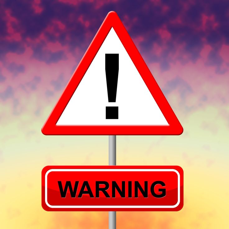 Warning sign with colourful background