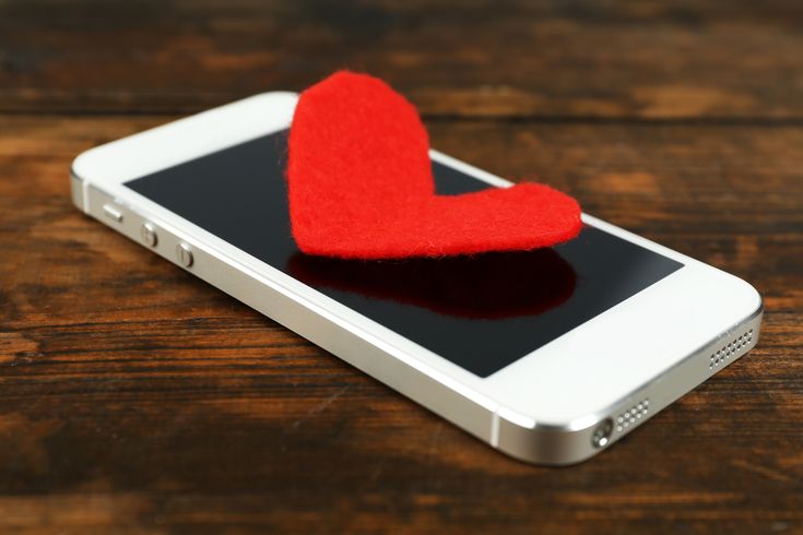 heart on top of phone