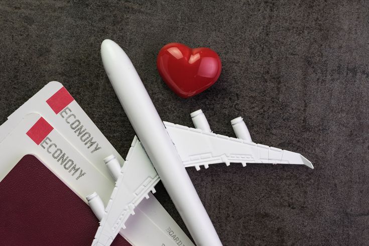 plane with love heart and passport