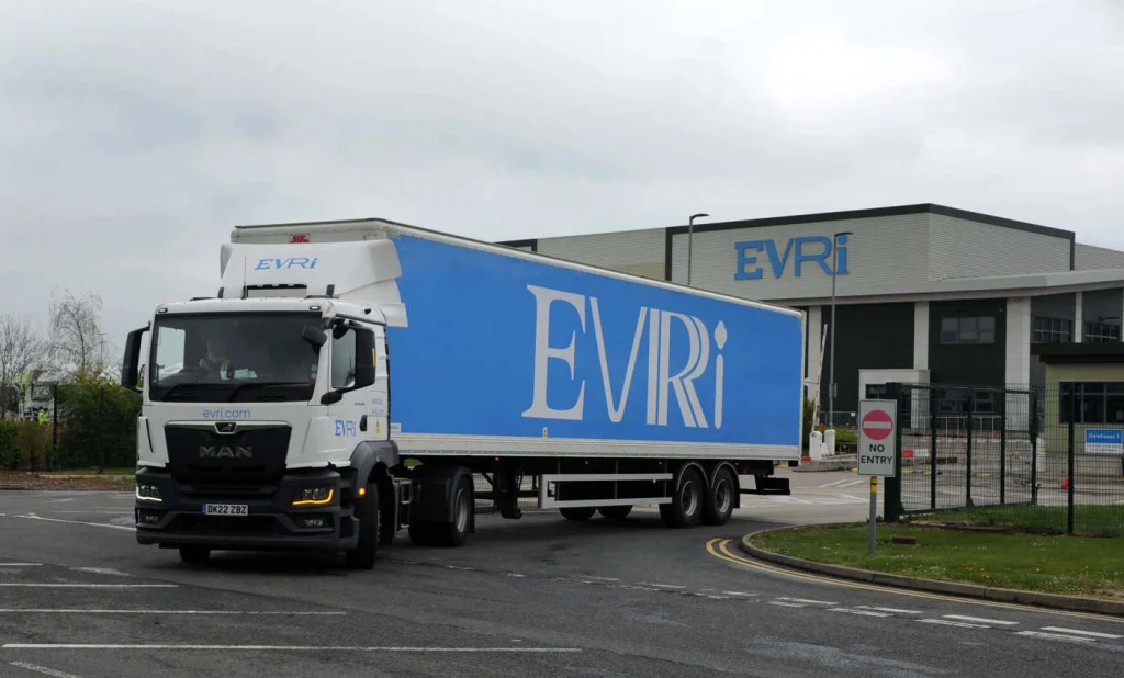 A picture of an Evri truck leaving a warehouse